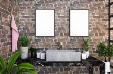 Bathroom with washbasin with picture frame attached to the wall